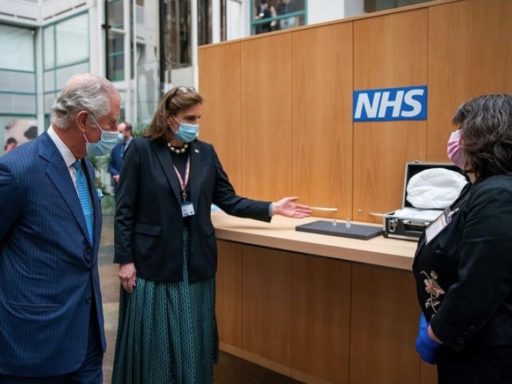 Dr Emily Lawson (centre), pictured with Prince Charles and the Science Museum's Keeper of Medicine Natasha McEnroe
