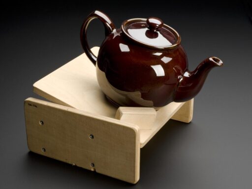 Teapot stand, hinged plywood, for use by people with arthritis